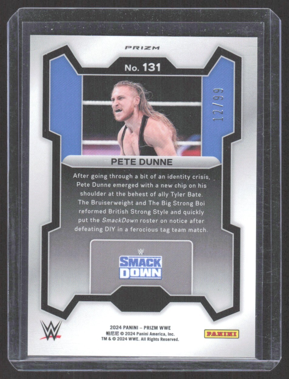 2024 PANINI PRIZM WWE PRIZMS RED DISCO PRIZM PETE DUNNE 12/99 #131