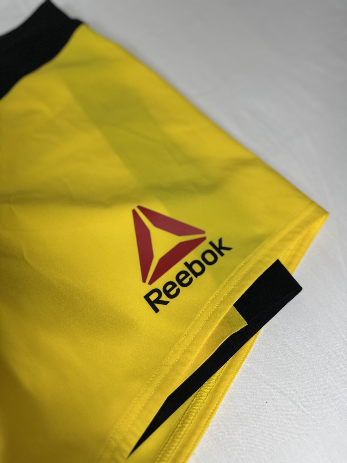 NWOT Reebok UFC CrossFit Women’s S27 Yellow Octagon Speedwick Performance Shorts