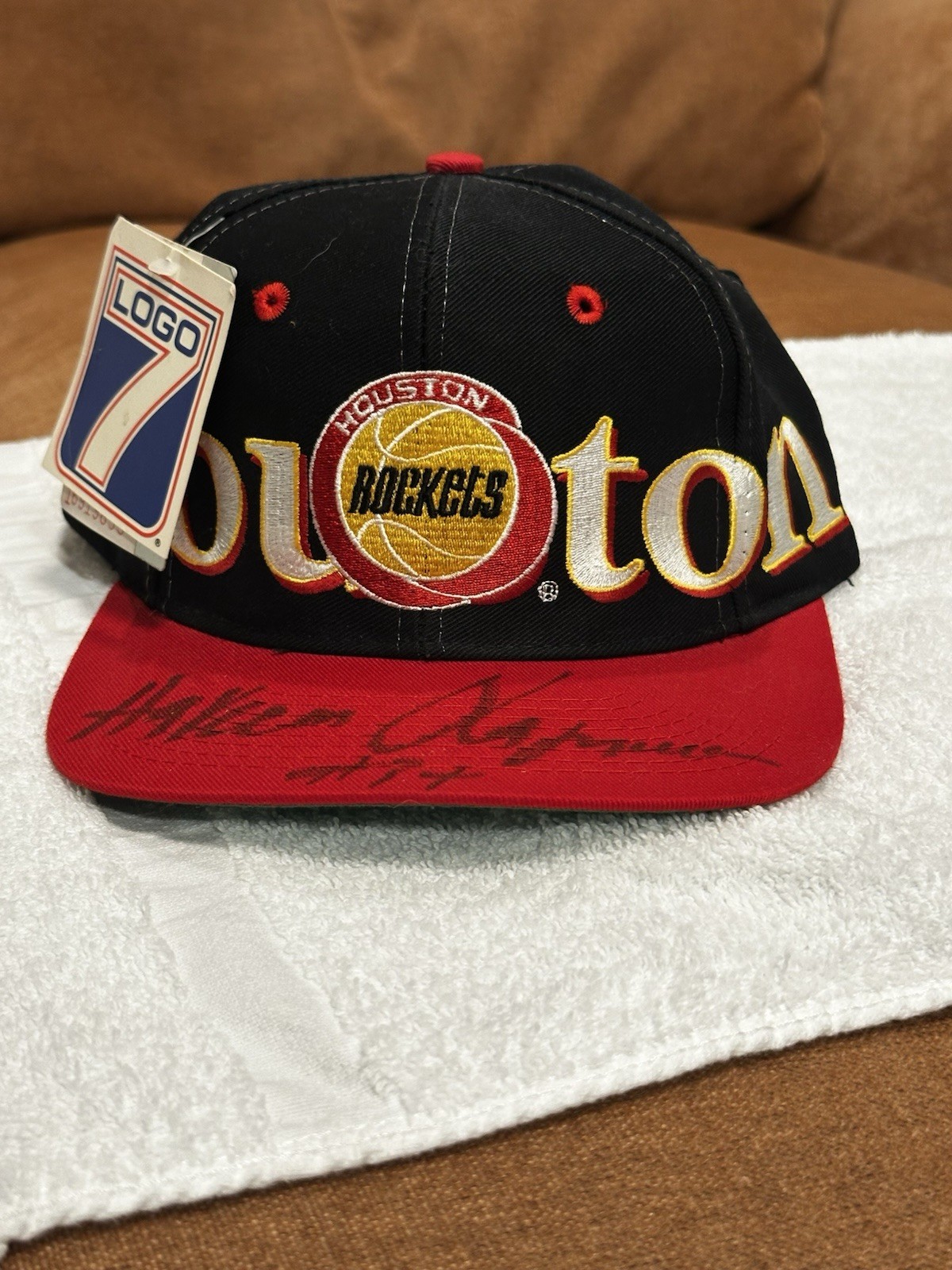 Autographed Hakeem Olajuwon Houston Rockets Hat + Three Bonus Hats (see below)
