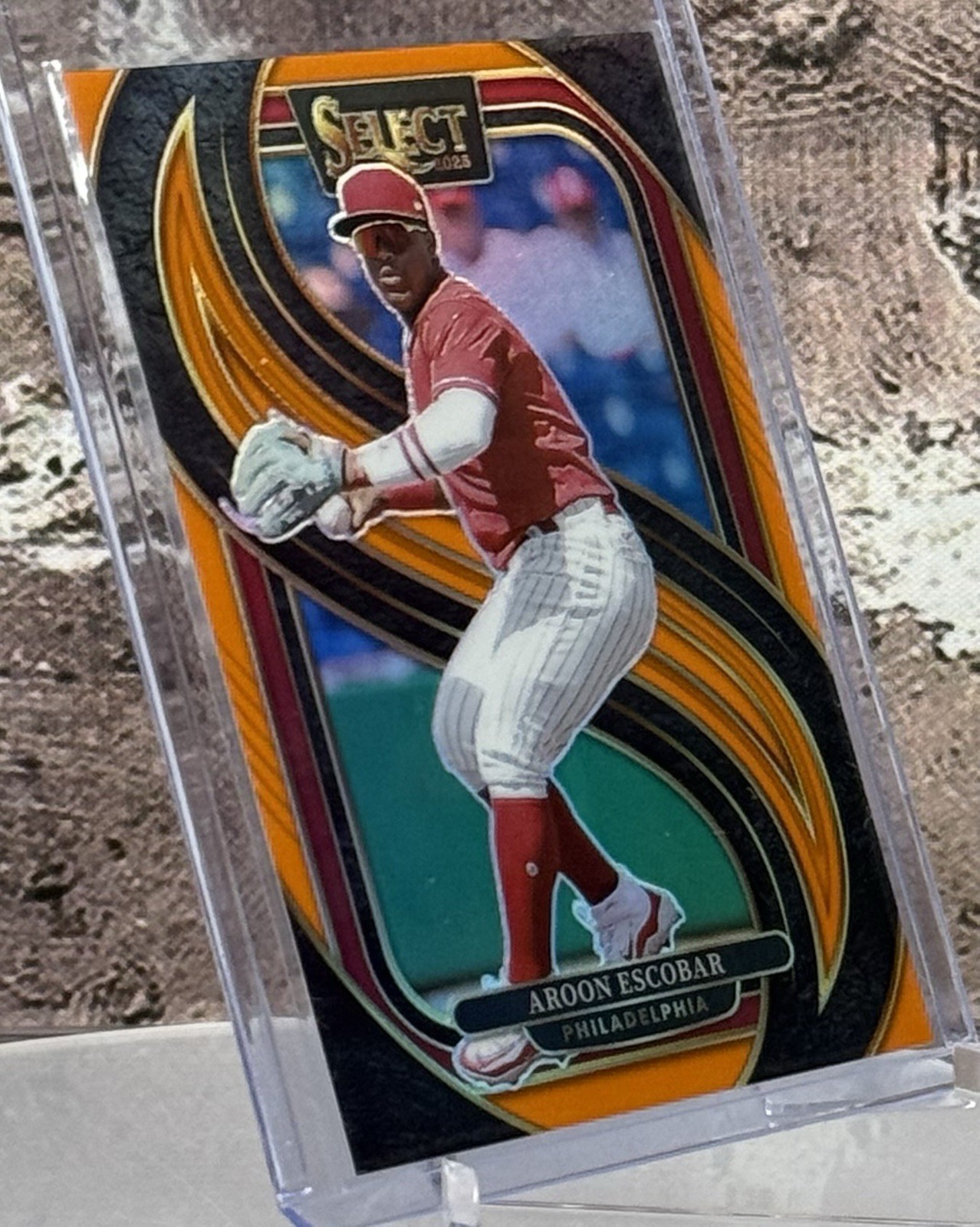 2025 Panini Select Aroon Escobar #106 Orange Prizm /49 (RC) Premiere Level