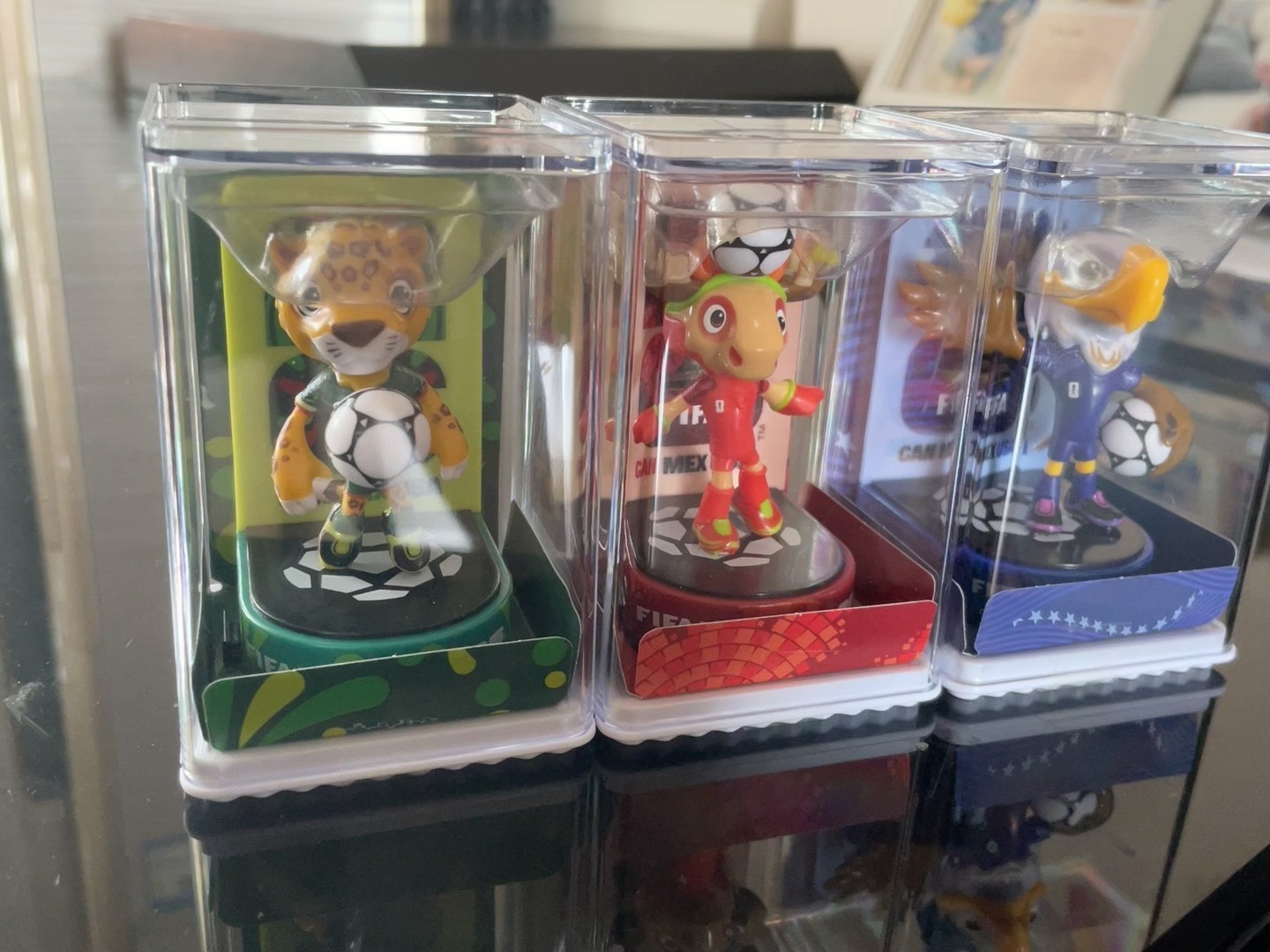 official FIFA World Cup 2026 mascots (Maple, Zayu, and Clutch) figure display
