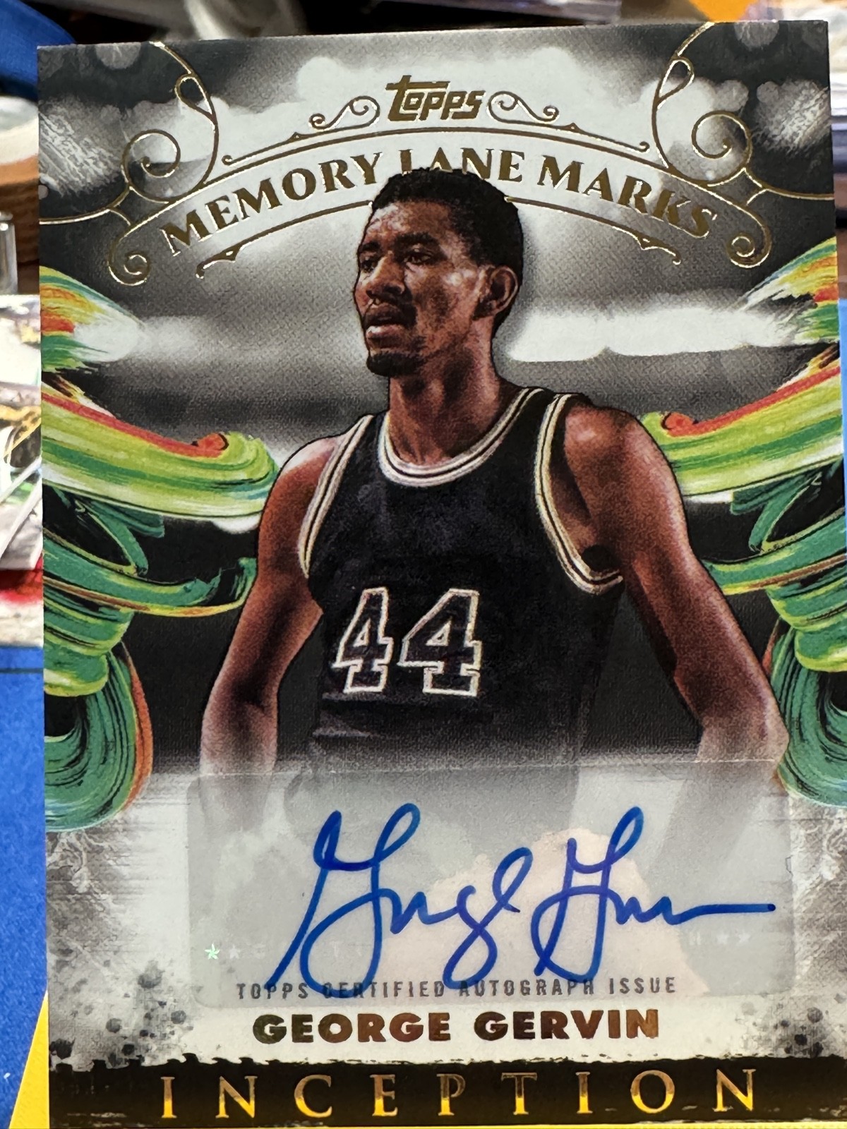2024-25 Topps Inception – Memory Lane Marks George Gervin, George Gervin #MLM-GG
